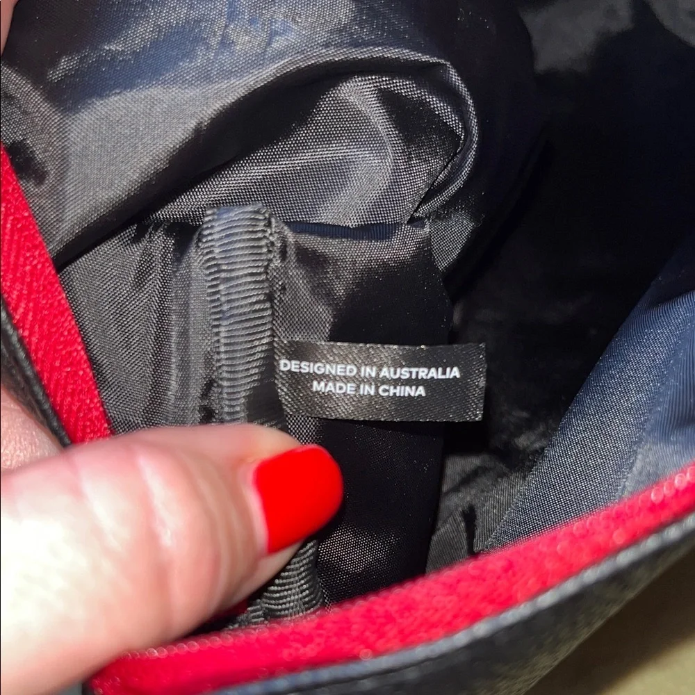 TUMI Textured Black Faux Leather toiletrie / travel bag
